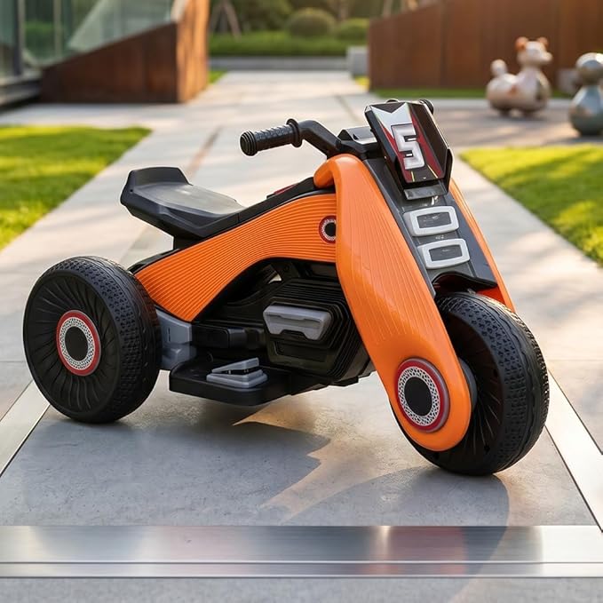 StarAndDaisy Electric Ride-On Bike/Vehicle for Kids, Toddlers & Baby – 3 Wheel Rechargeable 6V Motorcycle with Music, LED Lights, USB, Foot Acceleration and Comfortable Seat (Orange)