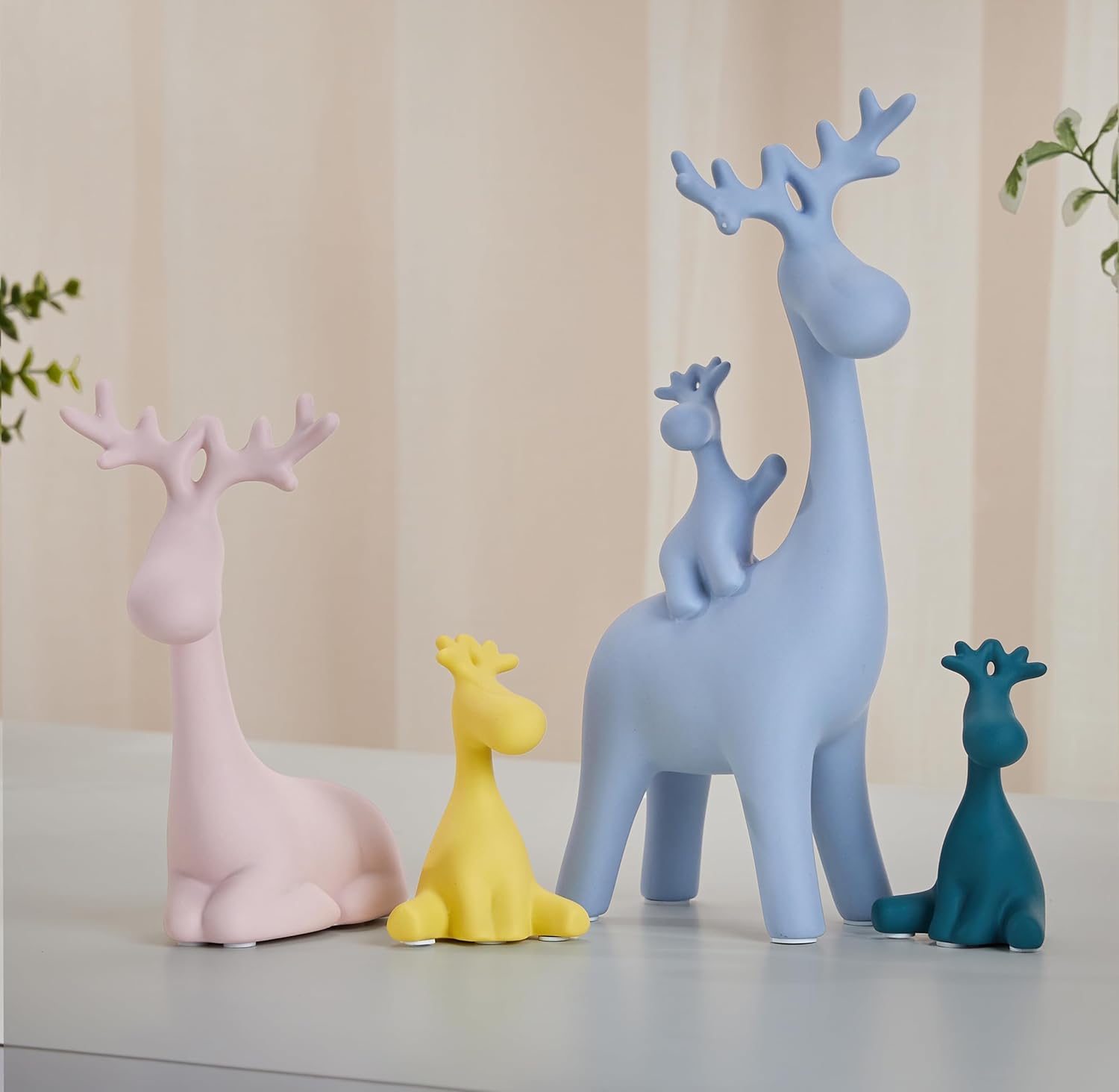 Amazon Basics Reindeer Family Statue for Home Decor | Resin Figurine Set (Pack of 4 Pieces, Multicolor)