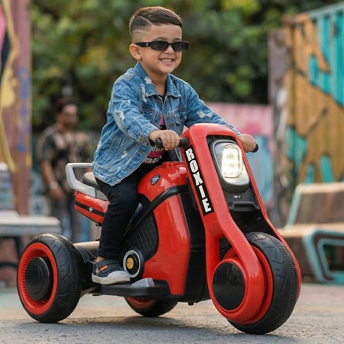 Toyzone Roxie Kids Electric Bike (Red) | Rechargeable Bike with 6V 4.5Ah Battery | MP3/USB/BT Music & LED Lights| Smooth Acceleration | 6 Months Battery warranty, For Kids Age 2 to 8 Years, Upto 35 kg