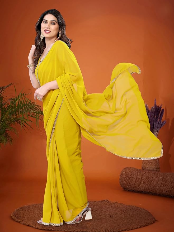 Amazon Brand - Tavasya Embellished Solid/Plain Bollywood Georgette Saree With Blouse